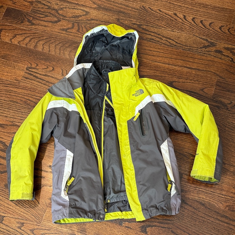 The North Face Kids Yellow and Gray ski jacket with shell and inner layer